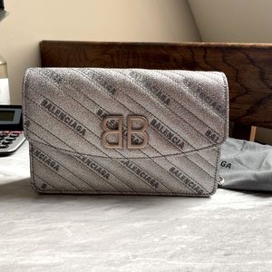 Balenciaga silver logo quilted bag.